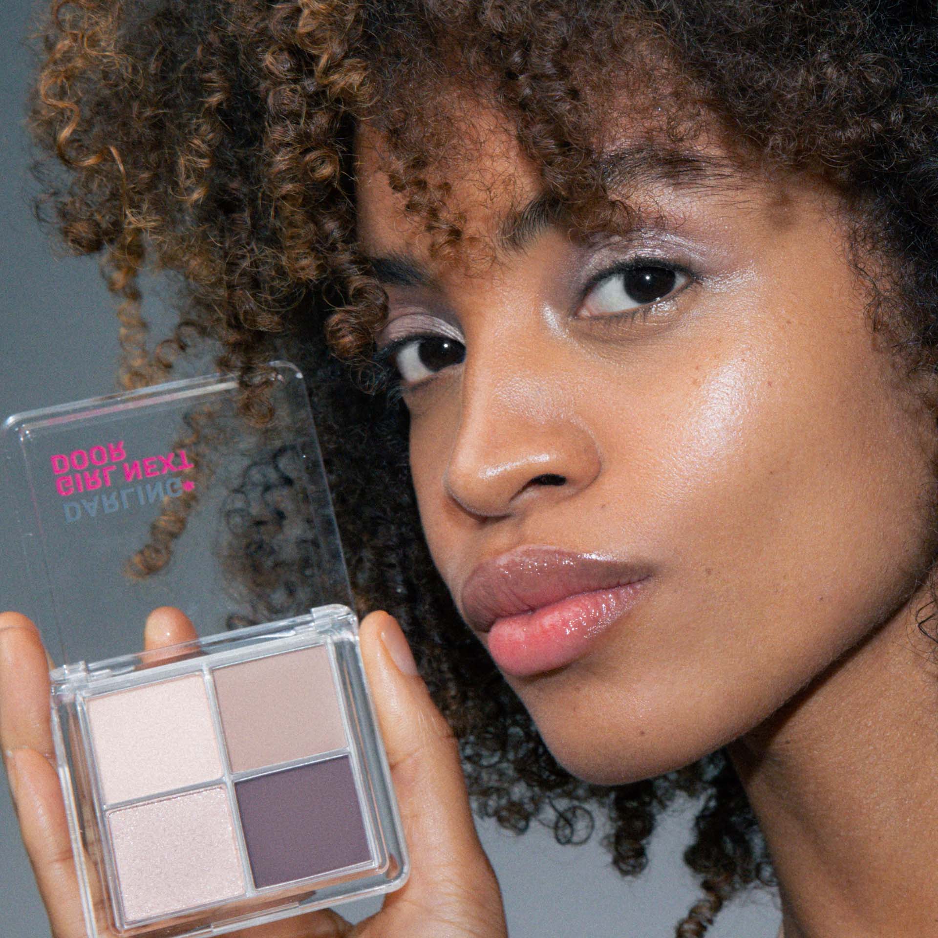 GIRL NEXT DOOR product photo at an angle