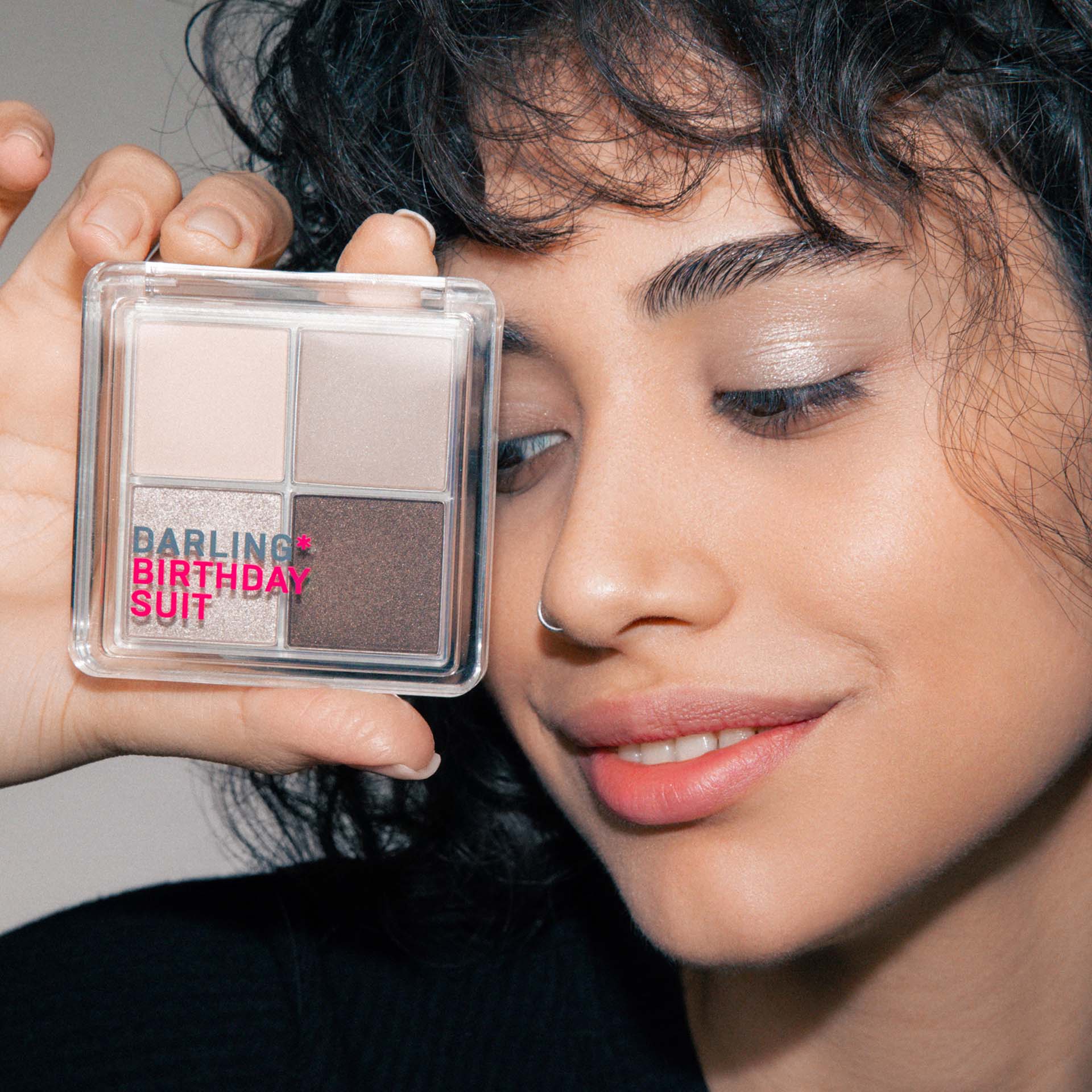 BIRTHDAY SUIT product photo at an angle