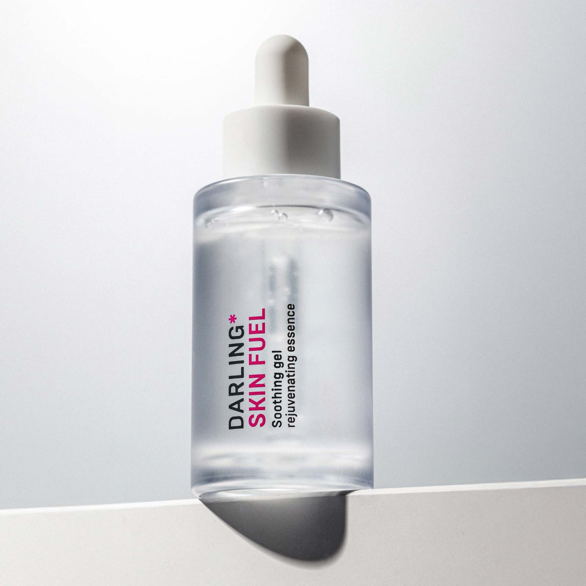 SKIN FUEL essence product photo with model